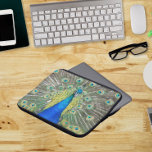 Blue Peacock Feather Plumage Laptop Sleeve<br><div class="desc">Protective,  zippered laptop sleeve that features the photo image of a gorgeous,  blue Peacock with colorful feather plumage. Image printed on one side. Select your laptop sleeve size.</div>