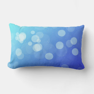 Blue pillow with abstract gradient design
