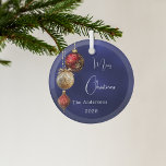 Blue red gold baubles Christmas Glass Ornament<br><div class="desc">An navy blue uneven colored background. Decorated with red and gold baubles.  Personalize and add your name,  year.  Text: Merry Christmas</div>