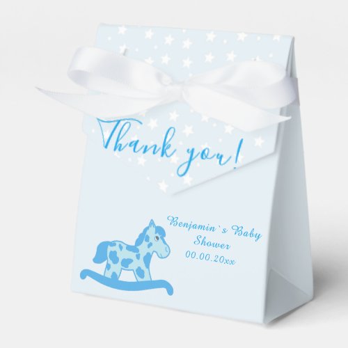 Blue Rocking Horse Baby shower Party favor box - A cute blue rocking horse baby shower party favor box. Thank you elegant script typography. Personalize the name and the date. Blue colors for a baby boy babyshower party celebration. Great party supplies for a new baby. Rocking horse themed favor box with white stars on a light blue background.