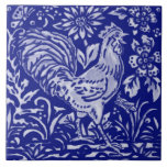 Blue Rooster Chicken Floral Farmhouse Rustic Art Ceramic Tile<br><div class="desc">A proud rooster, butterfly and grasshopper in white on rich dark blue form a stylized design with a farmhouse, country or even rustic theme. There are wild flower floral and leaf designs inspired by antique delft and oriental chinoiserie pottery motifs and colors. This tile is also available in a matching...</div>