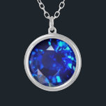 Blue Sapphire Necklace<br><div class="desc">Sterling silver pendant including 18" chain. The necklace comes in two sizes,  small and medium. There are two shapes available which are square and round. Also there are options of rolled gold as well. A beautiful big bright blue sapphire gemstone. This design is in rolled silver,  fashion jewelry.</div>