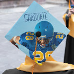 Blue Script Overlay Graduate Photo Football Player Graduation Cap Topper<br><div class="desc">Graduate written in tall blue typography over your senior portrait photo makes a simple graduation cap topper for a football player on a sports team. Customize with your name and high school or university class of 2024 on this minimalist text overlay design.</div>