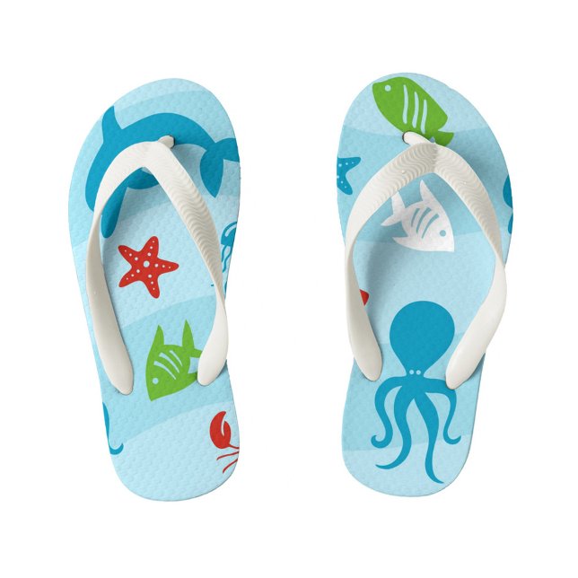 Blue Sea Kid's Flip Flops (A pair of light blue flip-flops with white straps, decorated with cartoon sea creatures.)