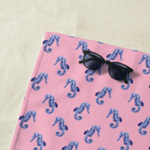 Blue seahorses on pink  beach towel