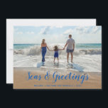 Blue Seas and Greetings  Beach Christmas Holiday Card<br><div class="desc">A clever take on the traditional holiday card features your favorite beach photo with Seas & Greetings in a modern tropical blue script . Personalize with your family name and the year.</div>