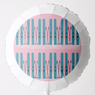 Blue skis on snow & pink background balloon