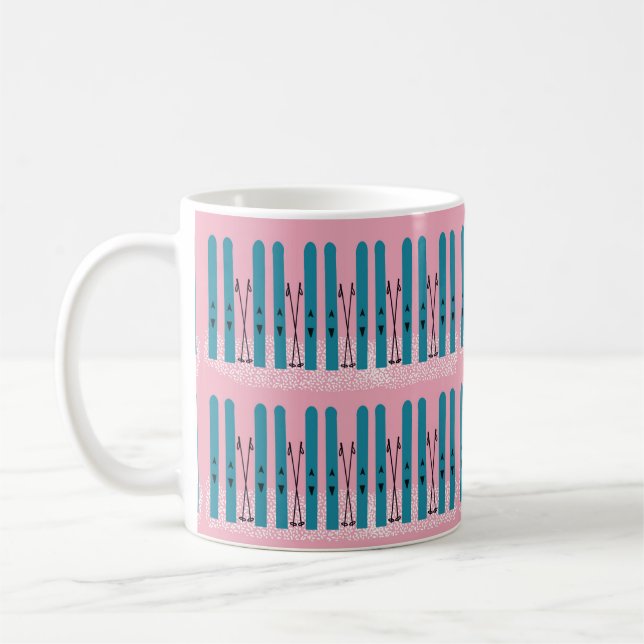 Blue skis on snow with pink  coffee mug (Left)