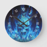 Blue Skull Head With Flames Round Clock at Zazzle