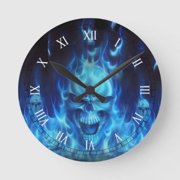 Blue Skull Head With Flames Round Clock by nonstopshop at Zazzle