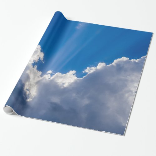 Blue sky with white clouds and ray of sunshine wrapping paper