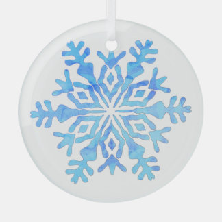Blue snowflake design on a glass ornament