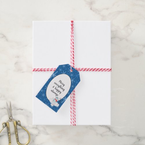 blue snowflake with holiday greeting gift tags