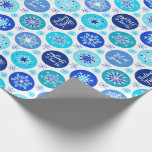 Blue Snowflakes Wrapping Paper<br><div class="desc">This snowflakes wrapping paper has a beautiful blue Snowflakes holiday pattern. This pattern has three sayings “Merry & Bright”, "Let it Snow" and “Feeling Frosty” in pretty scrolling script font. There are 11 different snowflakes with 6 colors of blue. You can make the pattern on the wrapping paper smaller or...</div>