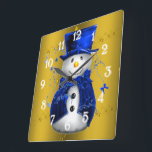 Blue Snowman on Gold Christmas Square Wall Clock<br><div class="desc">A cute and colorful Christmas pattern featuring snowmen dressed in blue velvet top hat and vests,  on a festive golden background with gold stars to add a stylish and whimsical touch to your Christmas home decorations this year.</div>