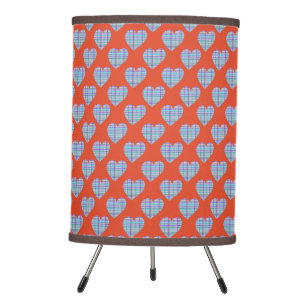 Blue striped hearts on warm red tripod lamp