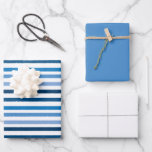 Blue  Striped White Wrapping Paper Sheets<br><div class="desc">This wrapping paper set features a multi shade blue stripe pattern on the first sheet,  sheet two coordinates with a solid blue and sheet three is solid white.</div>
