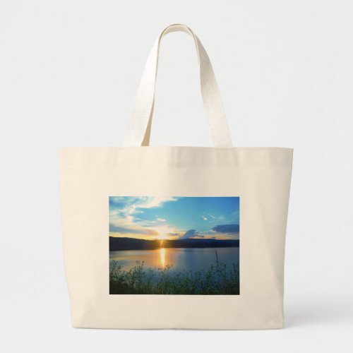 Blue sunset on lake large tote bag