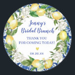 Blue Tile Lemon Bridal Brunch Classic Round Sticker<br><div class="desc">Designed to coordinate with the Jenny's Lemon Collection, this bridal luncheon sticker features a yellow lemon and white floral wreath. There is a hint of the blue tiles around the edge of the round sticker. The bride's name and bridal luncheon is written in a modern and trendy script font. The...</div>