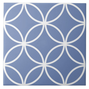 Blue tile, white repeating circle leaf pattern ceramic tile