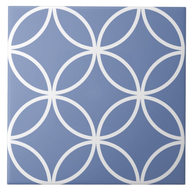 Blue tile, white repeating circle leaf pattern ceramic tile (Front)