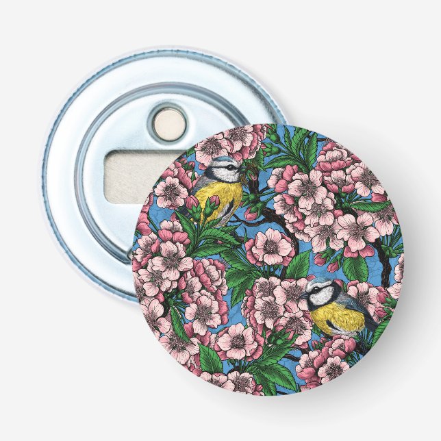 Blue tit birds in the blooming cherry tree on blue bottle opener (Front)