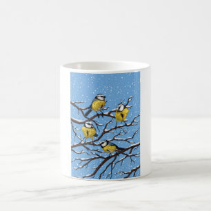Blue tit birds in winter coffee mug