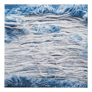 Blue torn denim jeans texture with space for text faux canvas print