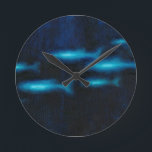 Blue Translucent Fish Silhouettes Round Clock<br><div class="desc">This vibrant fine art print of a group of blue translutent fish swimming will be a great addition to any Zazzle product and will bring a great pop of color. Get it today!</div>
