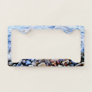 Blue water with colorful stones license plate frame