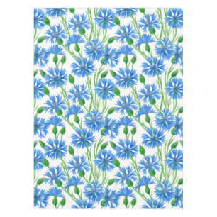 Blue watercolor cornflowers, wild flowers on white tablecloth