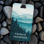 Blue watercolor mountains and forest scenery luggage tag<br><div class="desc">Luggage tag featuring a watercolor painting of scenic mountains and forest pine tree silhouettes in the foreground. Add your own  custom name or text.</div>