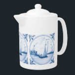 Blue White Delft Sailboat Teapot<br><div class="desc">Pretty vintage blue and white Delft art of a sailboat sailing on the water in the harbor, surrounded by floral elements. This art is reproduced from an antique handpainted tile. Click Customize It to add your name or message, change background colors, even save your design for later.</div>