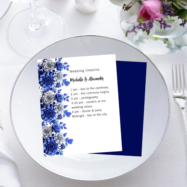 Blue white floral script budget wedding program (Creator Uploaded)
