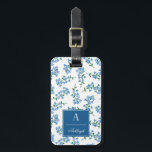 Blue White Forget Me Not Pattern Luggage Tag<br><div class="desc">Cute floral luggage tag with a pattern of forget-me-nots in blue,  white,  and green. Add your name and initial on a blue label. The back features a flower twig on a dark blue background and you can personalize with your name and address.</div>
