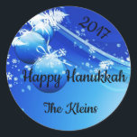 Blue & White Ornaments, Snowflakes, Pine Boughs Classic Round Sticker<br><div class="desc">Blue & White Ornaments,  Snowflakes,  Pine Boughs on a sticker.  
This wintery blue and white sticker will add an extra sparkle to your holiday packages,  tissue paper or envelopes. It's great for both Hanukkah and Christmas.</div>