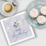 Blue White Watercolor Floral 80th Birthday  Napkins<br><div class="desc">A beautiful bouquet of soft blue and white peonies decorate this birthday party napkin. The birthday description is written in an elegant, traditional calligraphy. The birthday celebrant's name is written in a classic upright font. The background is a soft-bluish gray that contains a barely there botanical pattern and bokeh lights....</div>