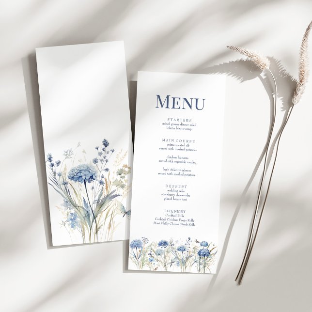 Blue Wildflower Garden Watercolor Wedding Menu (French Blue Wildflower Meadow Wedding Menu Card on a sunny white table.)