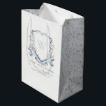 Blue Wildflower Monogram Crest Bridal Shower Medium Gift Bag<br><div class="desc">Pastel Wildflower watercolor Collection- it's an elegant watercolor Illustration of blue aqua watercolor delicate wildflowers with a modern minimal touch. Perfect for your modern floral wedding & parties. It’s very easy to customize,  with your personal details. If you need any other matching product or customization,  kindly message via Zazzle.</div>