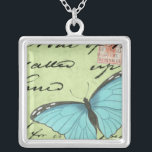 Blue-Winged Butterfly on Teal Postcard Silver Plated Necklace<br><div class="desc">This teal postcard carries a message of beauty. A delicate blue-winged butterfly rests on the card,  obscuring some of the script it contains. This Vision Studio print would make a great addition to your home!</div>