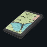 Blue-Winged Butterfly on Teal Postcard Tri-fold Wallet<br><div class="desc">This teal postcard carries a message of beauty. A delicate blue-winged butterfly rests on the card,  obscuring some of the script it contains. This Vision Studio print would make a great addition to your home!</div>