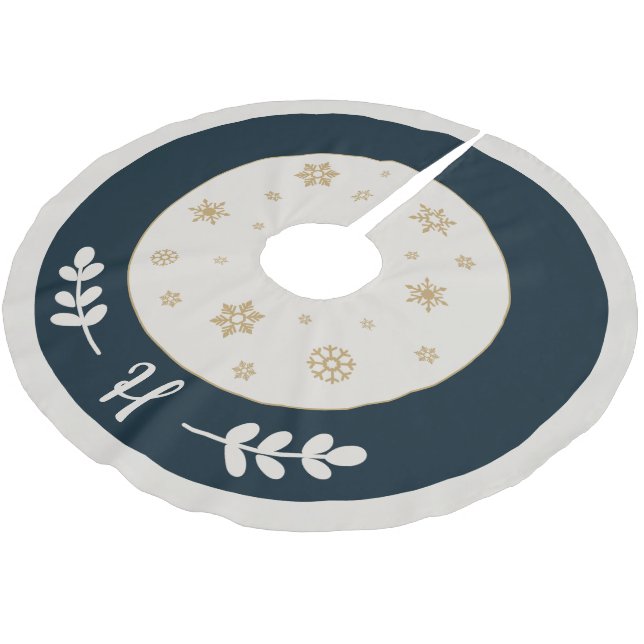Blue with golden snowflakes and monogram brushed polyester tree skirt (Angled)