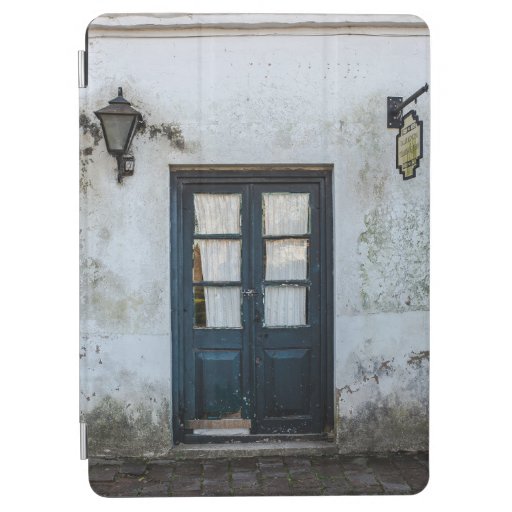 BLUE WOODEN DOOR PANEL IN WHITE BUILDING iPad AIR COVER