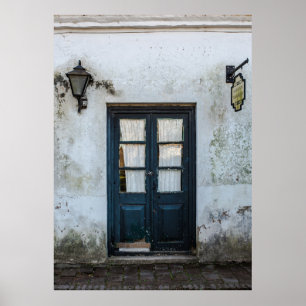 BLUE WOODEN DOOR PANEL IN WHITE BUILDING POSTER