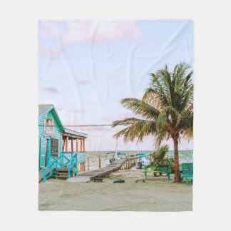 BLUE WOODEN HOUSE NEAR BODY OF WATER FLEECE BLANKET