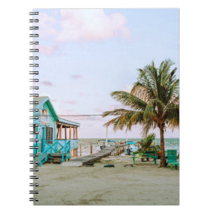 BLUE WOODEN HOUSE NEAR BODY OF WATER NOTEBOOK
