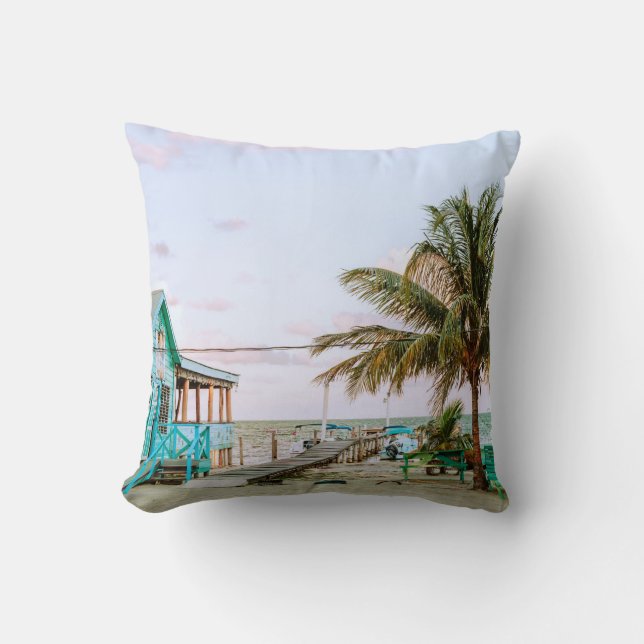 BLUE WOODEN HOUSE NEAR BODY OF WATER THROW PILLOW (Front)