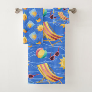 BLUE & YELLOW BOTTLES OF SUNSCREEN & SUNS BATH TOWEL SET