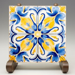 Blue Yellow Sunny Azulejos Elegance Ceramic Tile<br><div class="desc">Embrace the timeless charm of Mediterranean style with our Sunny Azulejos Elegance Ceramic Tile. Inspired by the classic Portuguese azulejos, this beautifully designed tile captures the essence of traditional craftsmanship through its vibrant yellow and deep blue palette. The intricate floral patterns and the flowing curves echo the artistry of historic...</div>