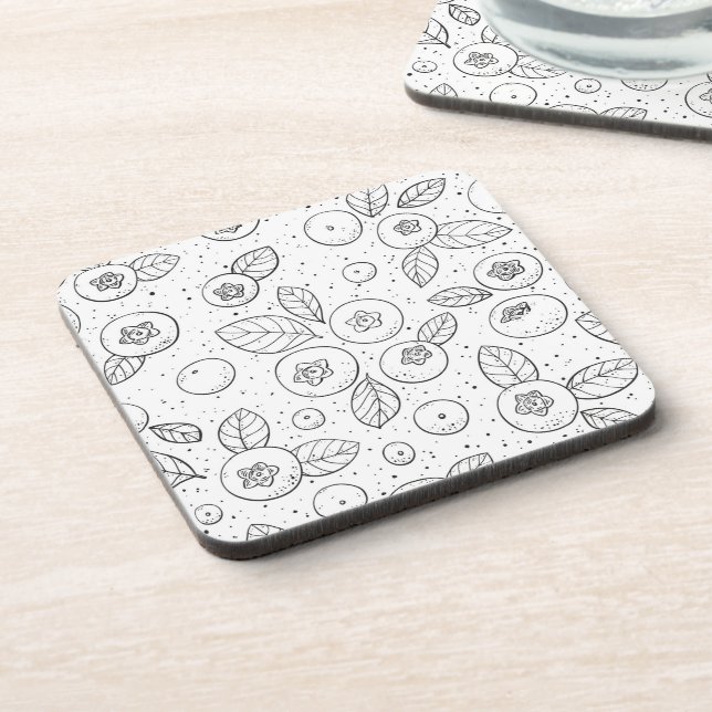Blueberries on black and white beverage coaster (Left Side)